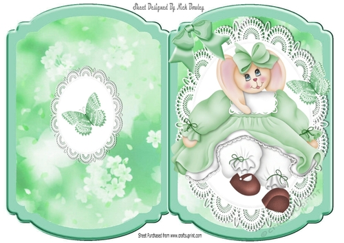 Cute bunny in green dress on lace with bow bracket card