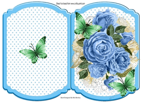 pretty posy of blue roses on lace with butterflies star bracket card 