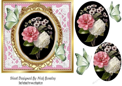 Pretty rose arrangement with butterflies and oval pyramids 7x7