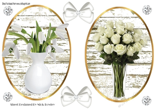 Two pretty toppers of white lilies and white roses with bows