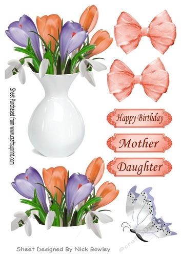 Pretty purple/peach Crocuses in a vase with bow cut outs