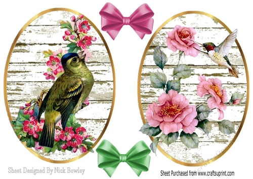 two pretty birds with rosesl toppers with bows