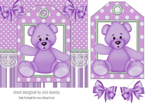 Cute purple teddy on a tag topper with bows