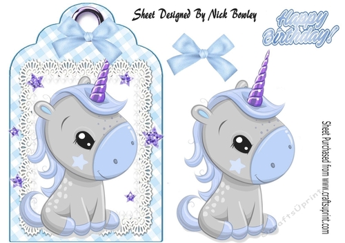 Cute little unicorn on lace tag/topper with blue bow