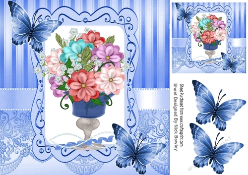 pretty vase of mixed flowers in ornate frame with blue butterflies 8x8
