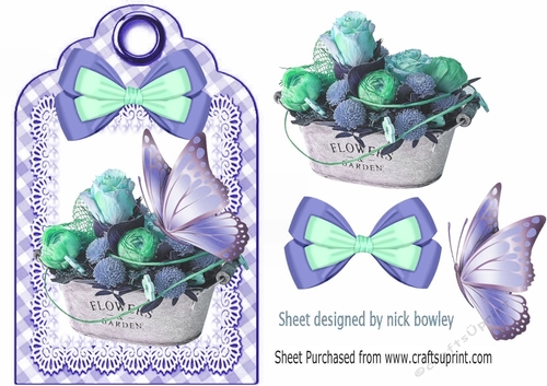 Pretty vintage roses with lilac butterfly and bow on a tag