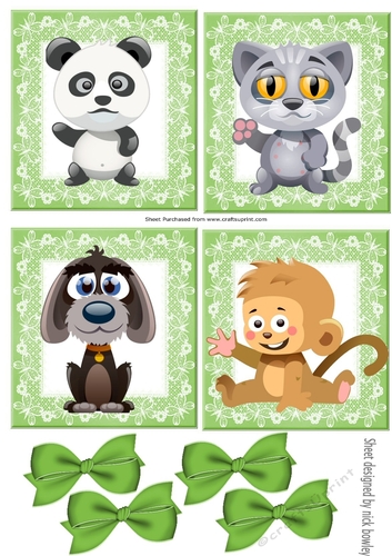 four cute animals with green bows toppers