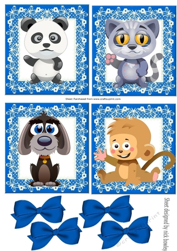 four cute animals with blue bows toppers
