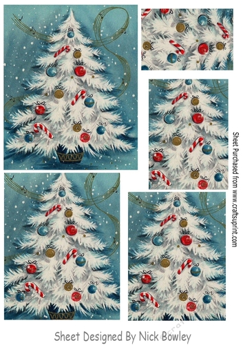 Pretty blue christmas tree with baubles pyramids