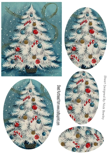 Pretty blue christmas tree with baubles and oval pyramids