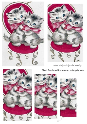 Cute pair of kittens cuddling on a chair pyramids
