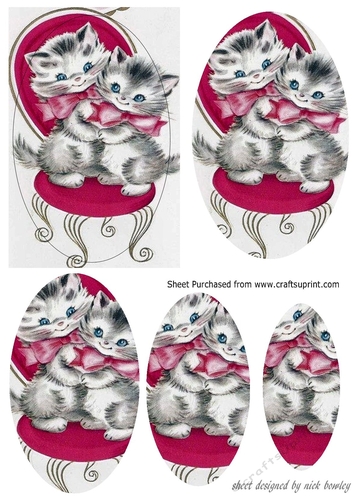Cute pair of kittens cuddling on a chair oval pyramids