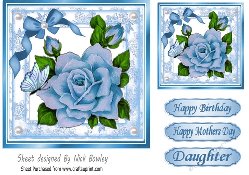 Large blue rose with pearls, bow and butterflies 7x7