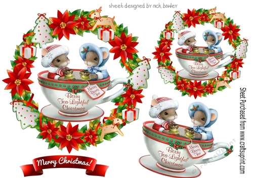Cute little mice in a teacup in festive toppers