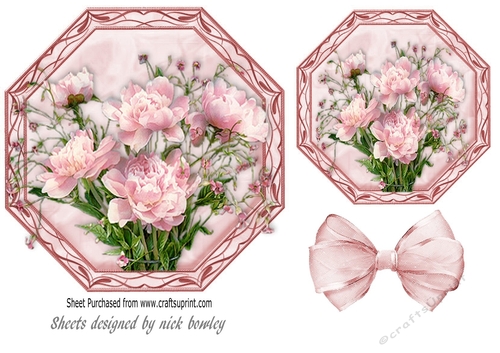pretty pink flowers in ornate toppers with organza bow