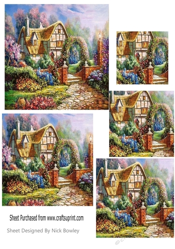 Pretty Cottage with flowers pyramids