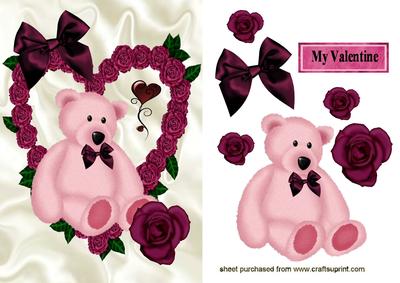 Pink Teddy in Heart of Red Roses
