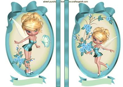 Little Fairys with Turq Bow in Oval Frame Toppers