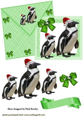 Penguins in Santa Hats on a Green Card and Envelope