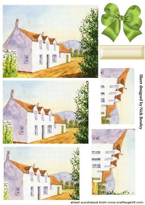 White Country Cottage with Thatched Roof Pyramids