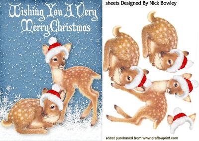Cute Little Deers in the Snow in Santa Hats