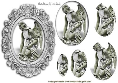Garden Stone Angel in Ornate Frame Oval Pyramids