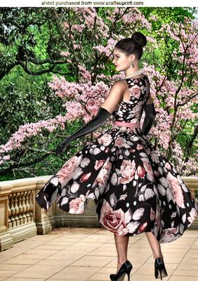 Pretty Girl in Floral Dress in a Garden A4