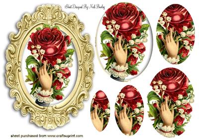 A Hand Holding Rose in Gold Frame Oval Pyramids