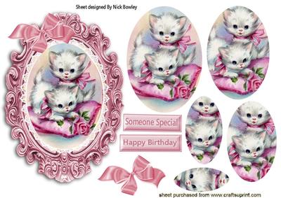 Cute Kitties on a Cushion Playing Oval Pyramids