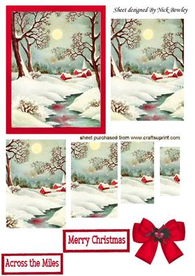 Snow Scene of Cottages in Red Frame Pyramids