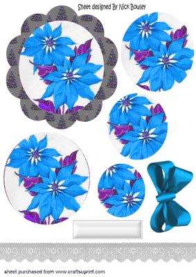 Pretty Blue Poinsettias in Tree Scalloped Frame Pyramids