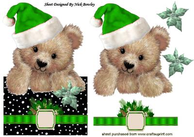 Little Fuzzy Bear in Green Santa Hat with Bow Over the Edge