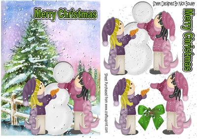 Little Girls Building a Snowman in the Snow