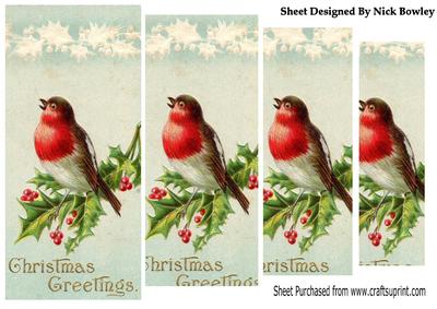 A Lovely Red Robin on Holly Pyramids