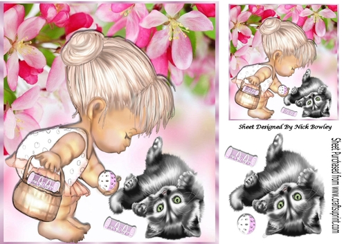girl playing with kitten with toys