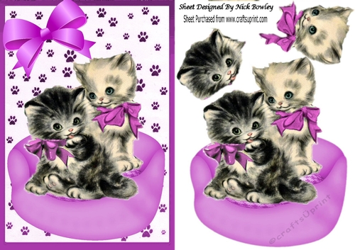 Cute vintage kittens in a basket with pink bow