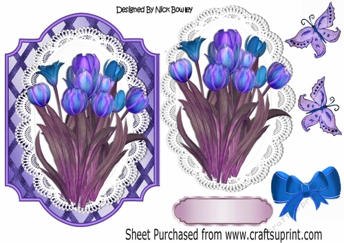 Pretty shades of purples/blue tulips, on lace with bow