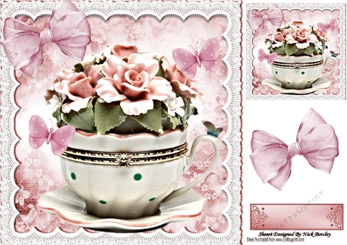 Pretty porcelain Roses in a ornamental teacup 8x8