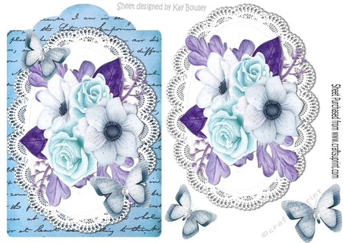 blue painted roses and paper butterflies on script topper & lace