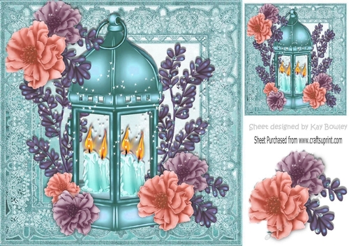 pretty turq lantern with candles and  flowers in ornate frame 8x8