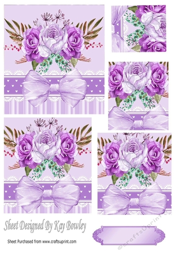 Pretty purple painted roses with organza bow in ornate frame pyramids