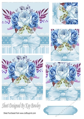 Pretty blue painted roses with organza bow in ornate frame pyramids