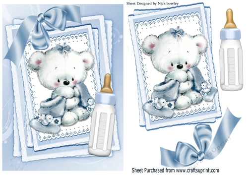 Cute little white bear with blue bow and  bottle on stacker and lace 