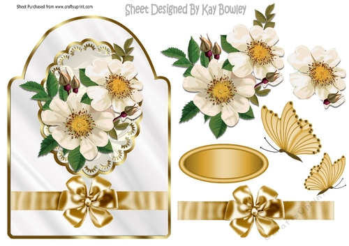 Pretty white flowers in oval lace frame with bow