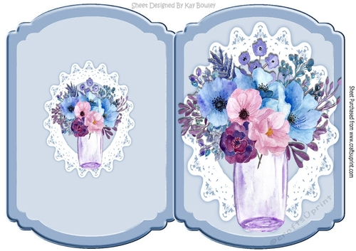 Pretty blue and pink flowers in a glass vase on lace bracket card