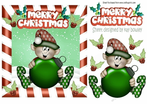 christmas elf with green  bauble and holly in the snow