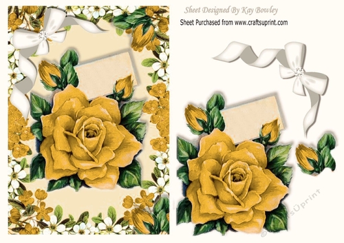 Pretty gold roses with diamante bow in flower frame
