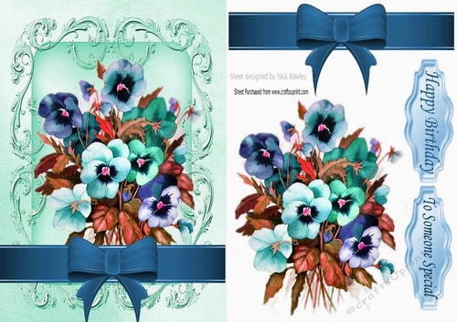 pretty turq shades of pansies with bow in scroll frame