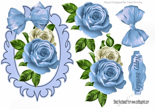 pretty blue/white roses with organza bow in ornate frame