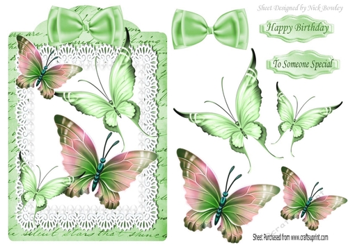 butterflies on lace with green bow on a tag